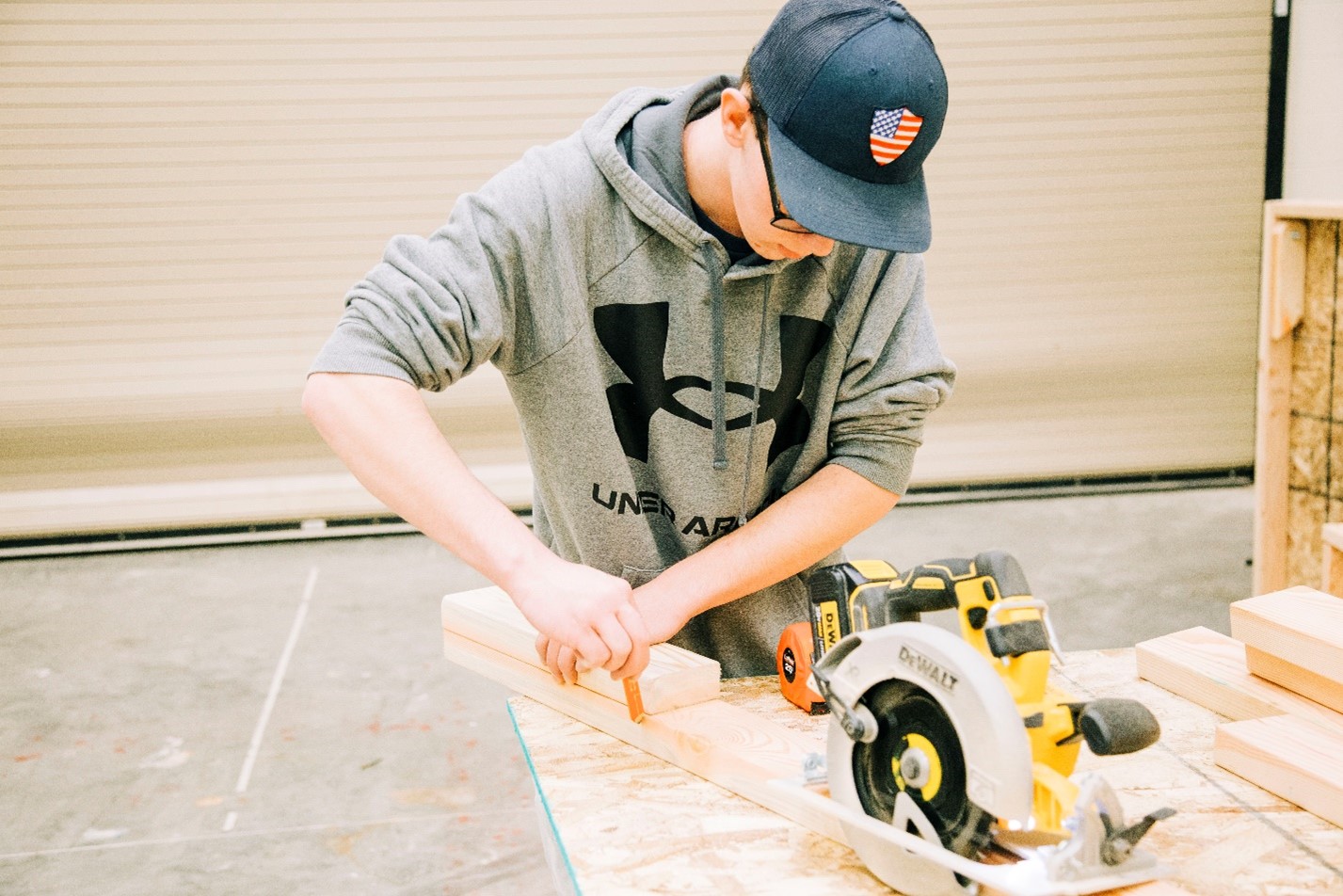 man with wood machine