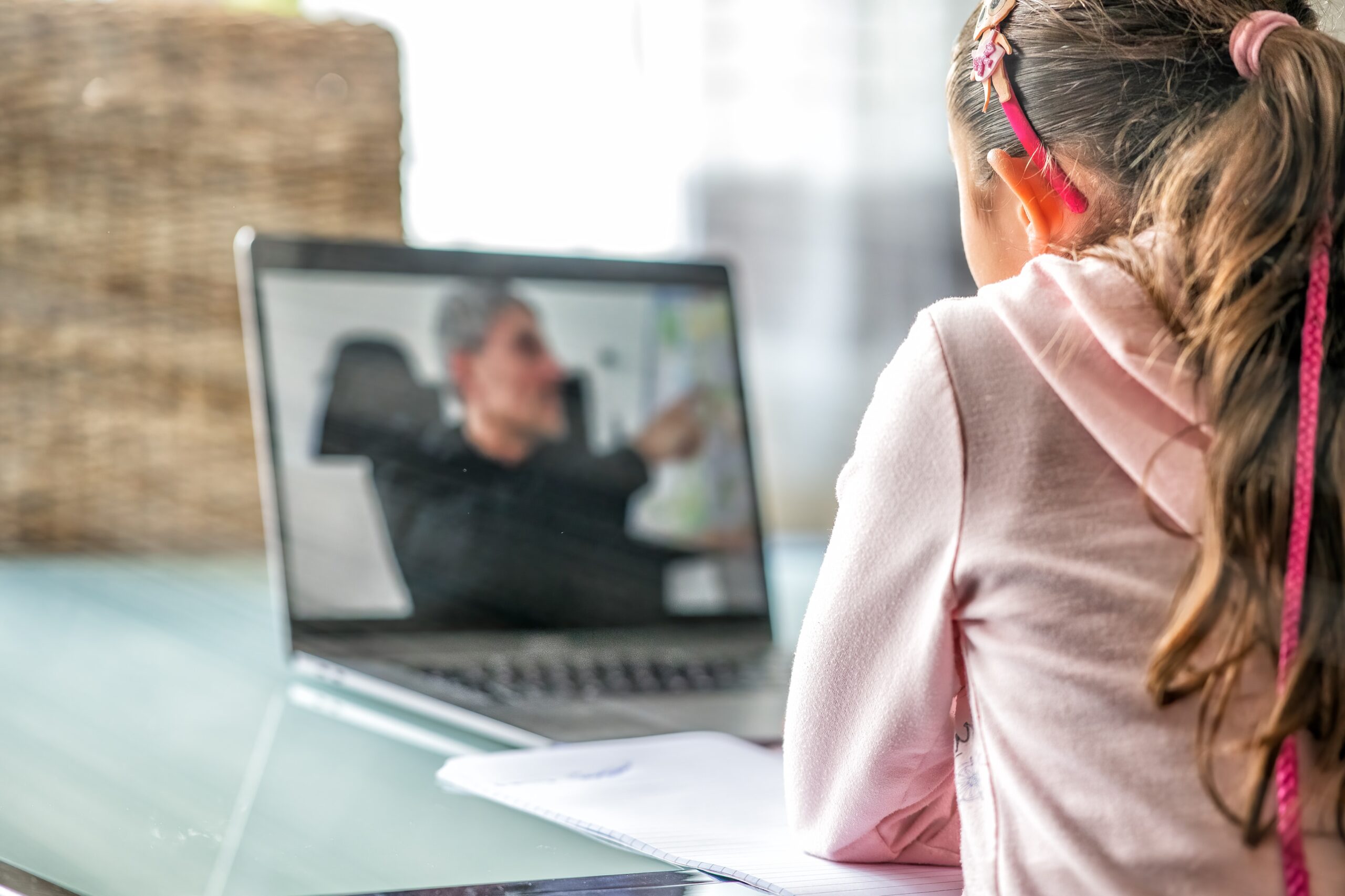 girl having a video call on laptop