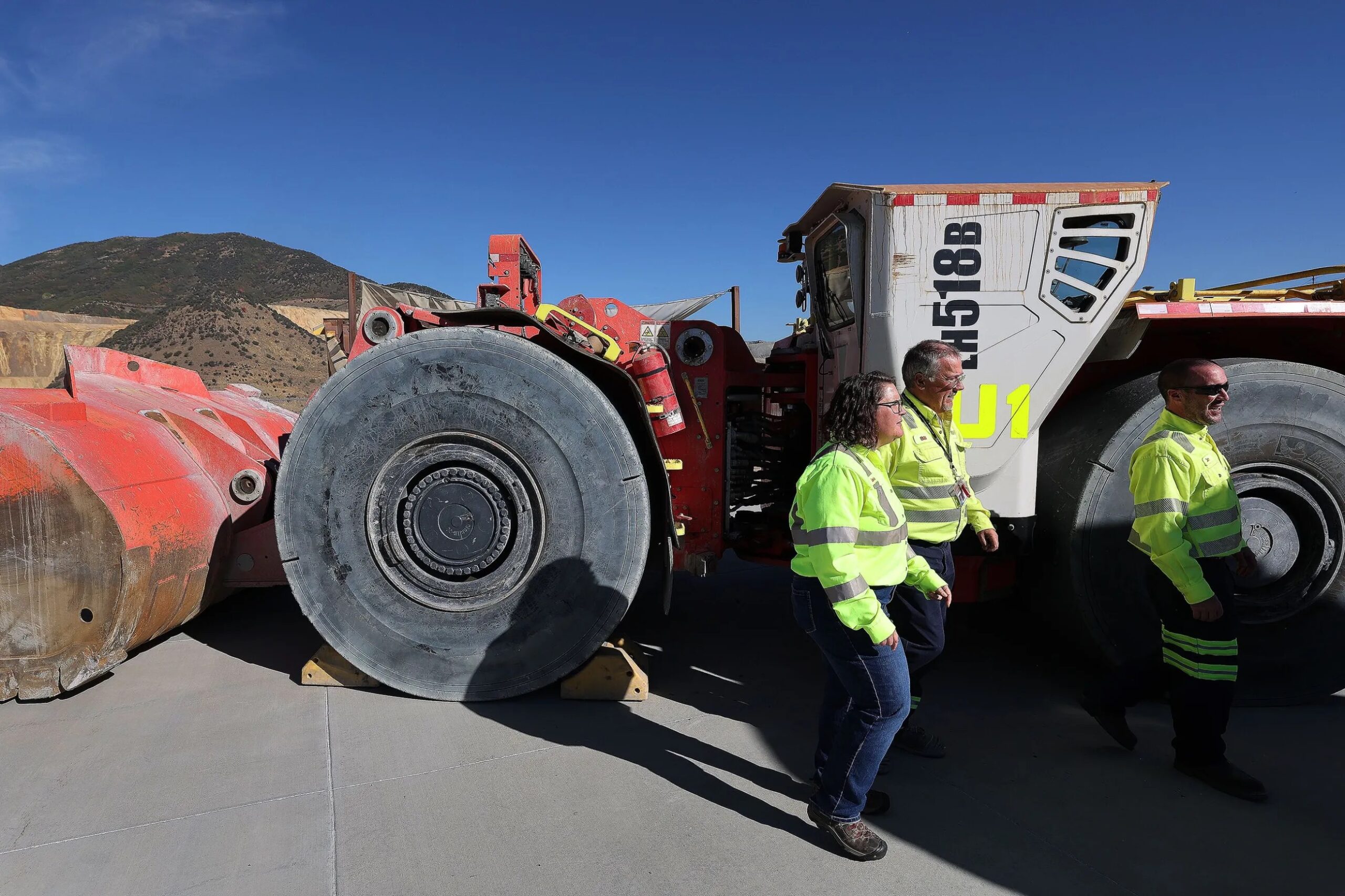 two man with green jackets