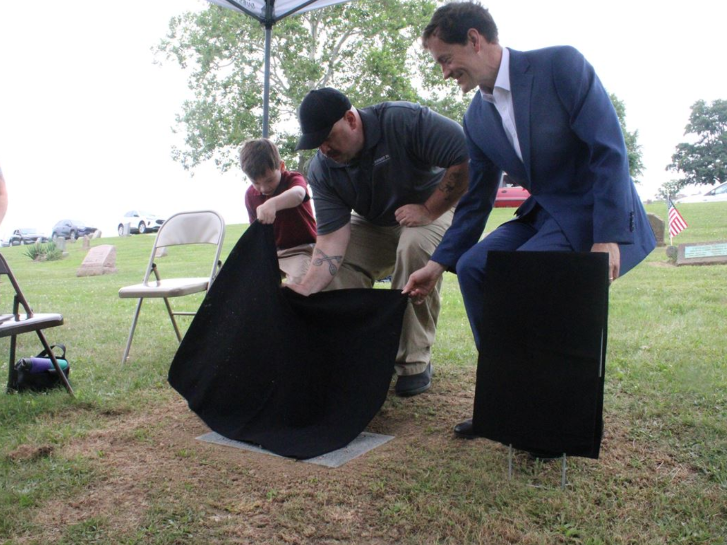3 man holding black bags