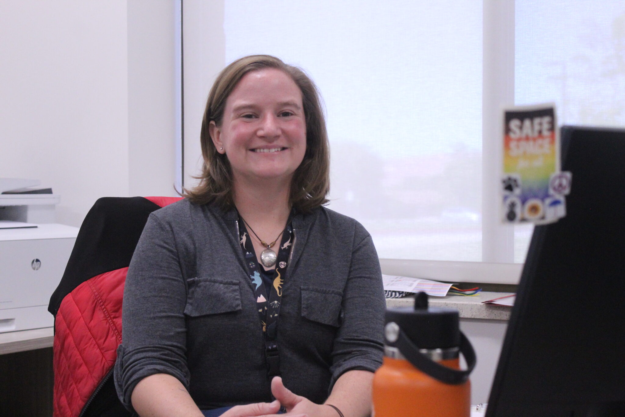 Woman smiling at a camera
