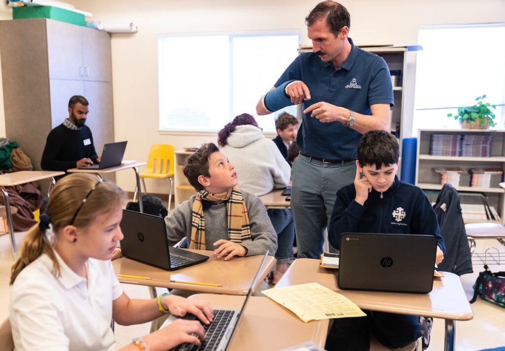 teacher with students in the classroom