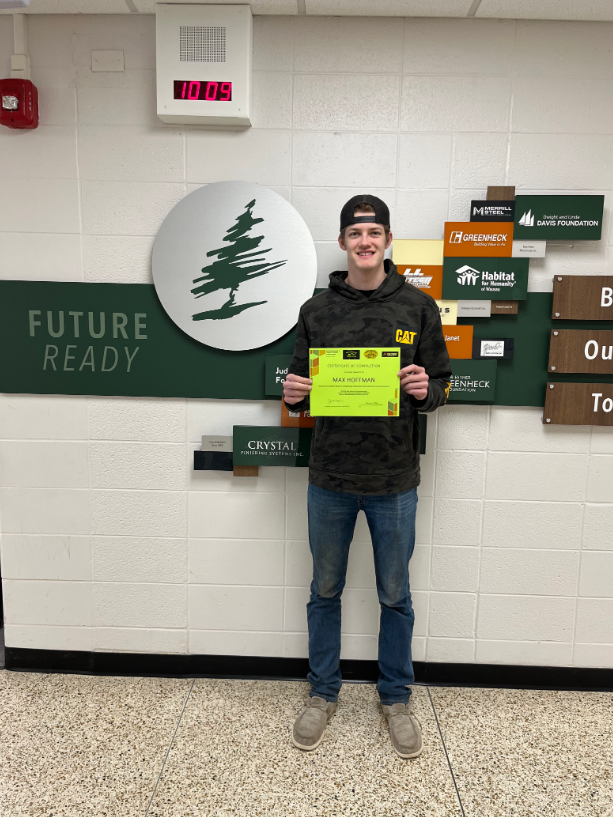 student with diploma